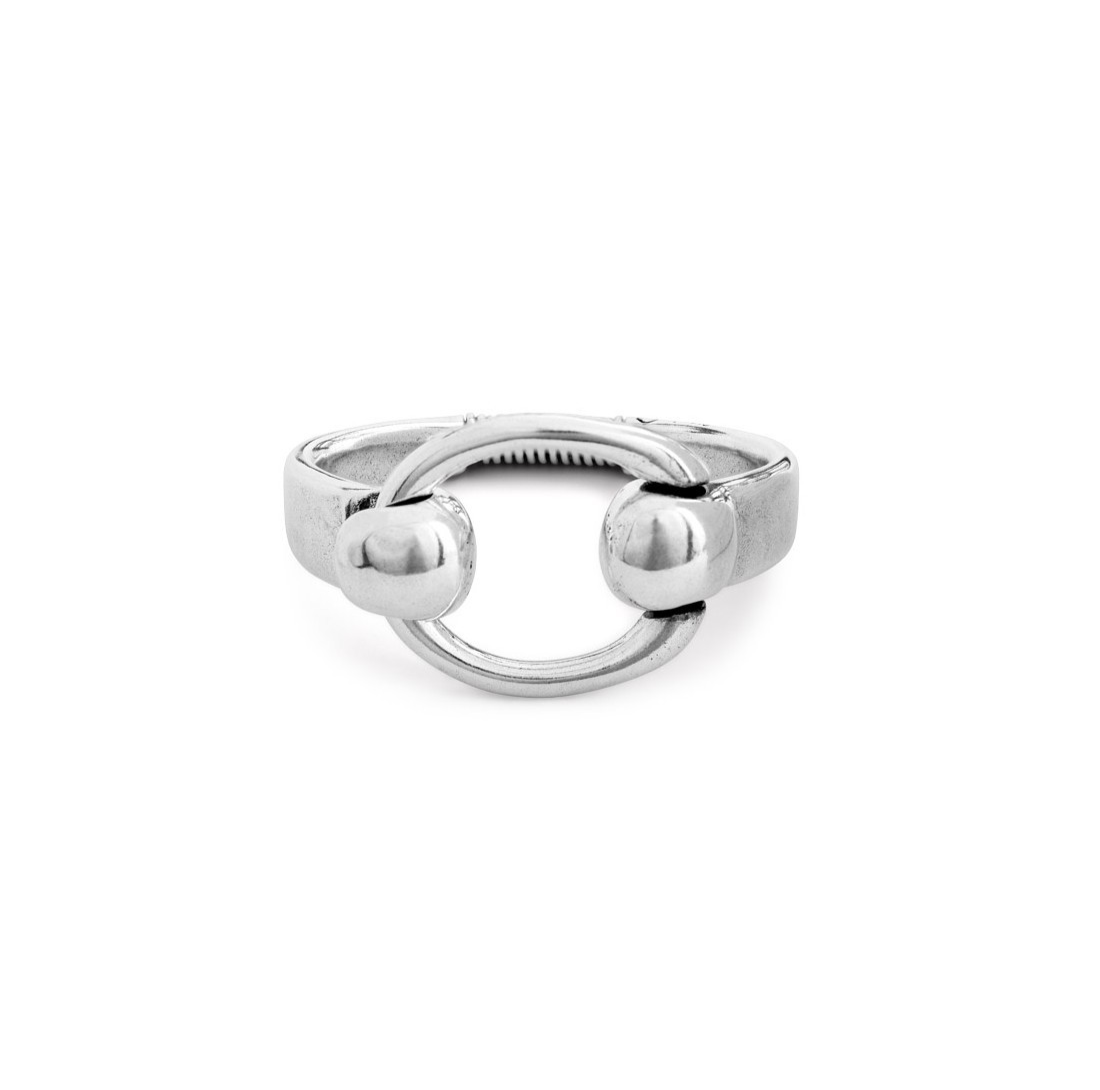 silver bracelet featuring an equestrian inspired bit design with an elastic spring opening
