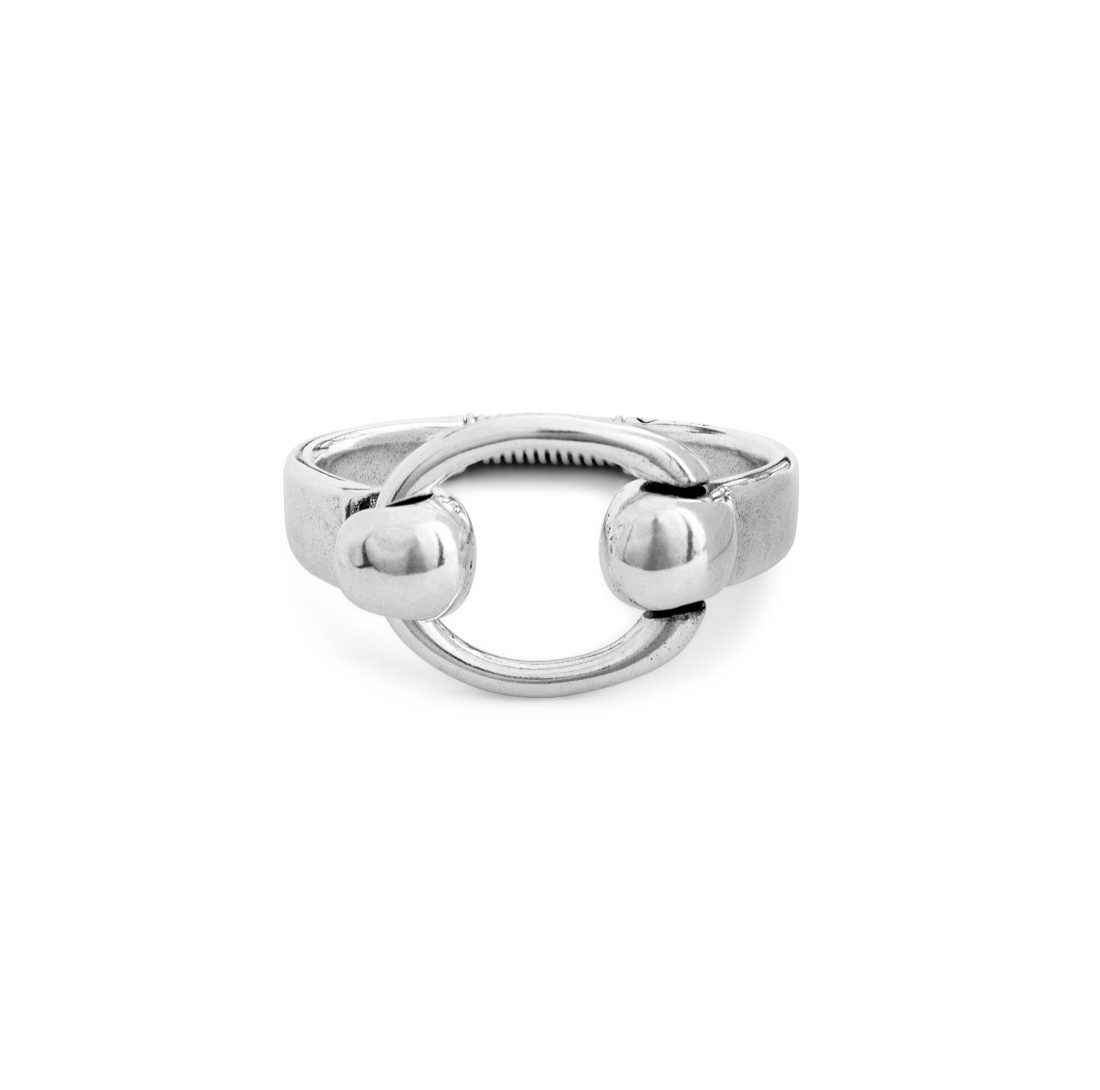 silver bracelet featuring an equestrian inspired bit design with an elastic spring opening 