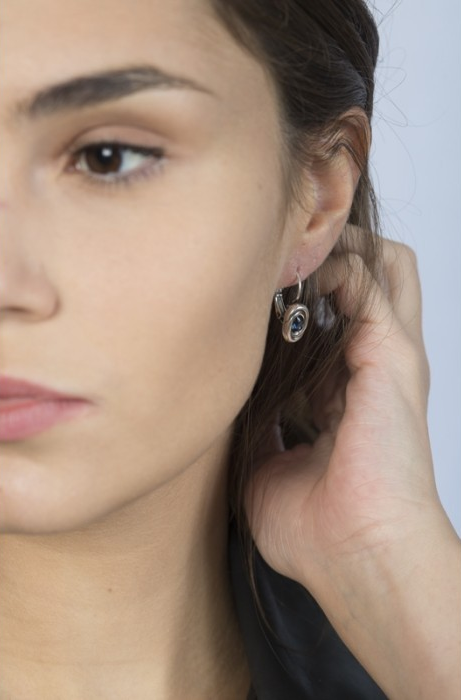 woman wearing Silver earrings with murano glass center