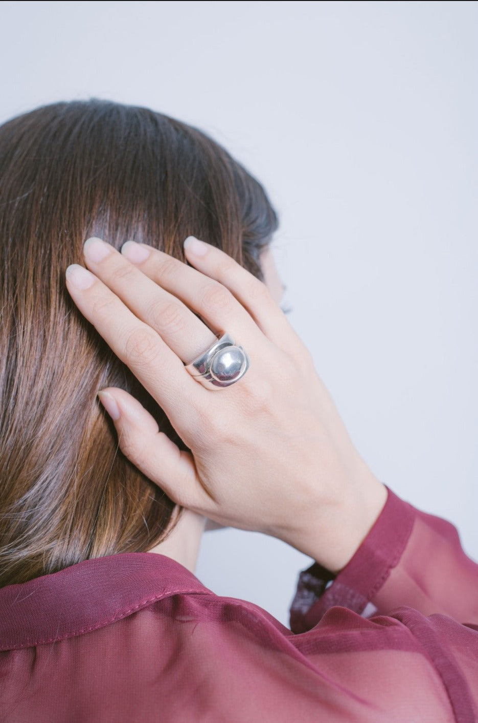 woman wearing 3 stackable women’s silver ring