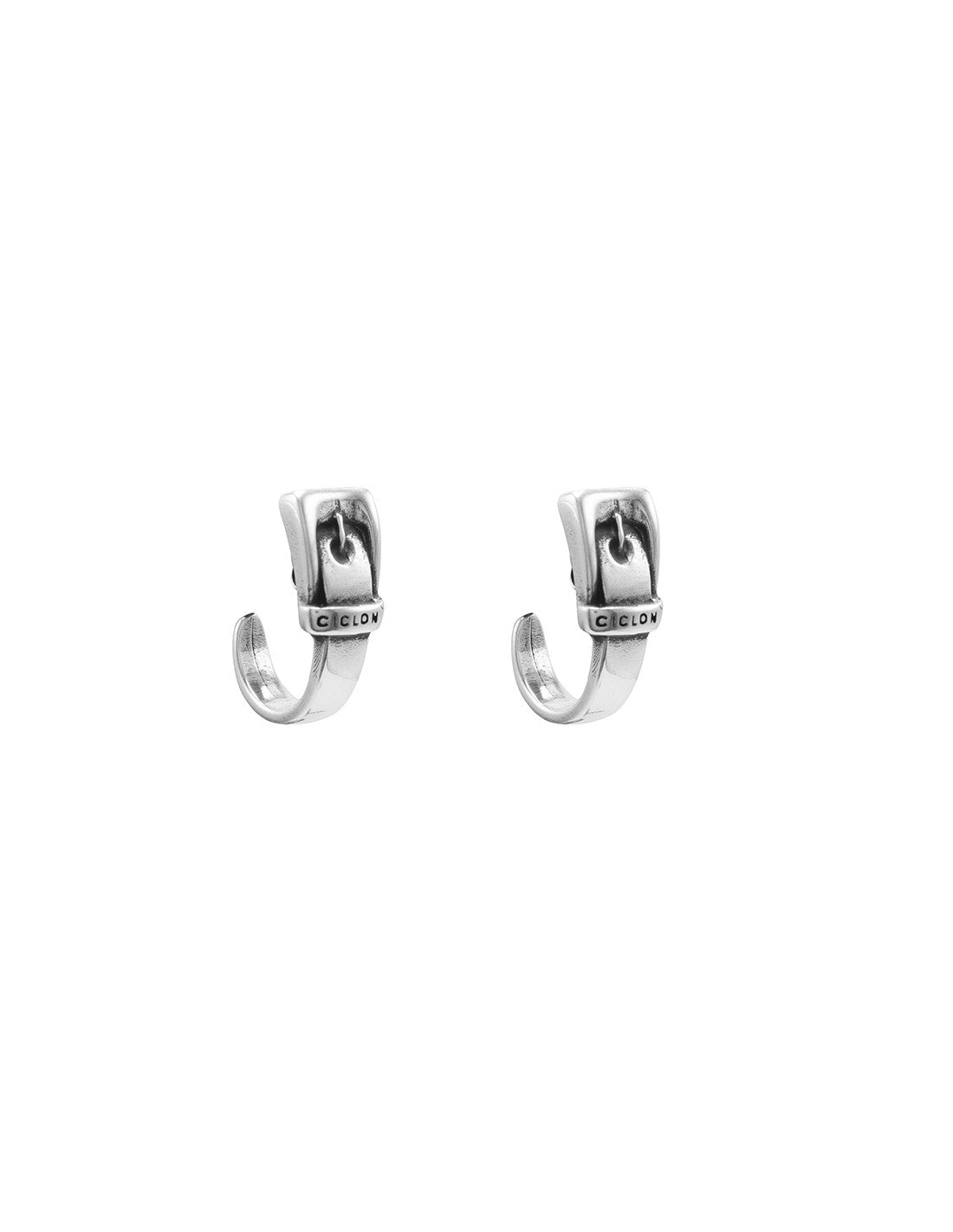 silver earrings shaped like buckles