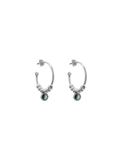 silver hoop earrings featuring green Murano glass accents