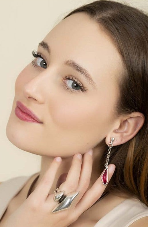 woman wearing silver-plated women's earrings featuring 60mm red Murano glass and chain design