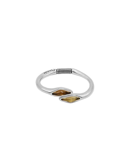 women's silver bracelet with open design adorned with vibrant brown and beige accents