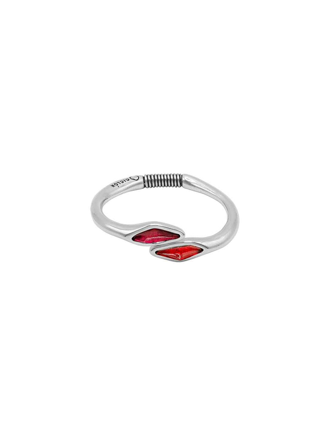 women's silver bracelet with open design adorned with vibrant red accents