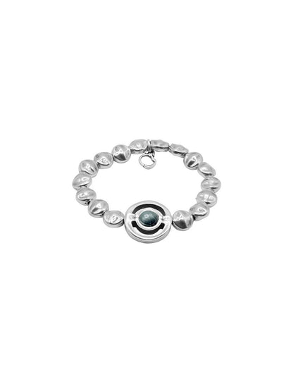 elastic silver bracelet with central motif adorned with a captivating green Murano glass sphere