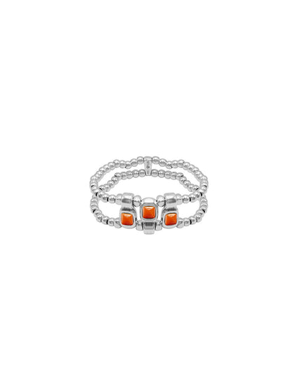 silver bracelet with beaded elastic and intricate orange Murano glass details at its center