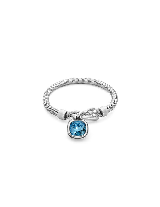  Silver bracelet adorned with a blue square faceted stone