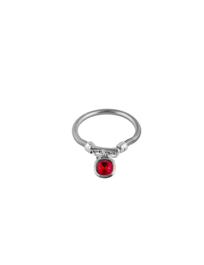 Silver bracelet adorned with a red square faceted stone