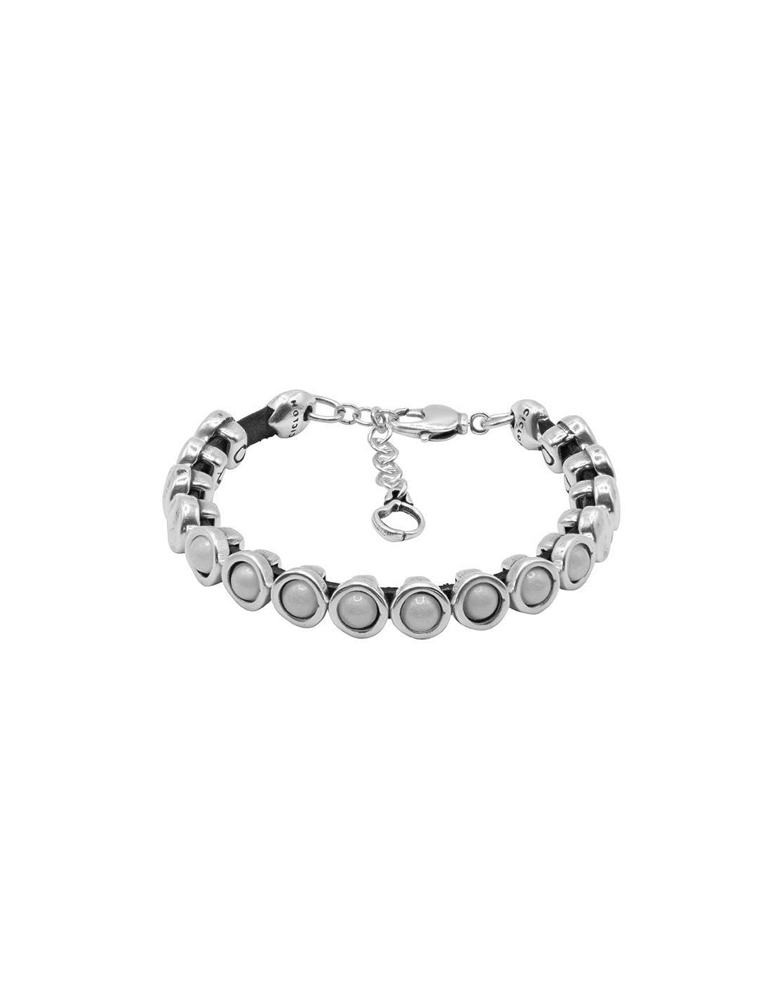 silver bracelet in a row of silver spheres set on leather, elegantly accented with white Murano glass